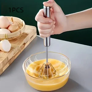 Un mélangeur à main pratique – parfait pour fouetter la crème, battre les œufs et plus, le choix idéal pour la pâtisserie et la cuisine. Un mélangeur à main pratique – parfait pour fouetter la crème, battre les œufs et plus, le choix idéal pour la pâtisserie et la cuisine.