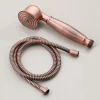 pommeau douche main antique laiton cuivre brossé rond perforé jets multiples manche ergonomique flexible métallique spiralé filetés patiné