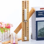 sablier sauna minuterie quinze minutes graduations bois verre sable blanc finition scandinave rustique fixation murale bureau décoratif élégant