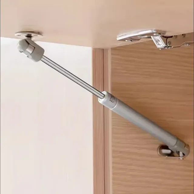 Charnières à ressort à gaz pour porte d'armoire