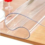 nappe transparente PVC souple durable imperméable antitache antieclaboussures antiabrasion brillante cristal enroulable découpable surmesure protection table bureau bois