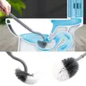 Brosse courbe de toilette de type S suspendue au mur de… – vue 1