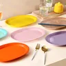 Assiettes de service ovales en porcelaine – vue 1