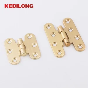 charnières meubles dorées alliage zinc finition brillante anticorrosion encastrables compactes pivot central six trous fraisés vis réglables toucher confortable qualité
