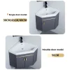 meuble lavabo angle mural moderne gris anthracite vasque céramique triangulaire blanche poignées dorées gain place rangement intégré robinetterie monotrou