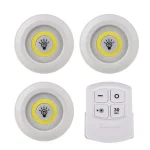 lot trois spots LED sans fil télécommande intensité variable piles AAA COB blanc chaud autocollants vis installation minuterie trente minutes