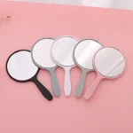 miroir maquillage poche main rond poignée ergonomique plastique ABS léger compact portable voyage pastel rose bleu vert blanc noir