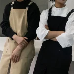 Tablier de serveur imperméable avec poches pour cuisine, restauration, café, fente avant, vêtements de travail Anti-salissure pour hommes et femmes pour Salon