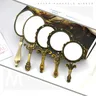 Miroir de maquillage à poignée – vue 1