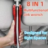 clé multifonctionnelle plomberie huit fonctions plastique renforcé rouge plat mâchoires crantées fentes ajustables saisir flexibles tressés écrous évier