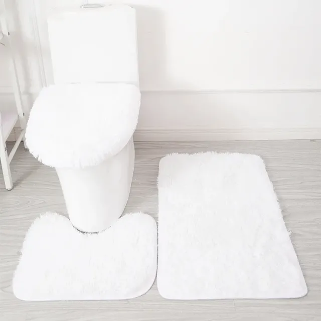 Ensemble de tapis de salle de bain blancs