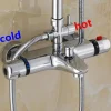 mitigeur thermostatique mural baignoire douche laiton chromé brillant design moderne poignées cylindriques indicateurs bleu rouge molette graduée antibrûlure
