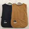 Tablier imperméable et résistant aux taches