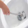 Brosse courbe de toilette murale de type S