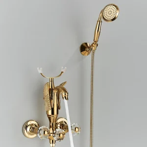 Robinet de baignoire de luxe en forme de cygne doré, poignée en cristal, ensembles de bain avec douchette à main, mitigeur chaud et froid pour salle de bains mural Robinet de baignoire de luxe en forme de cygne doré, poignée en cristal, ensembles de bain avec douchette à main, mitigeur chaud et froid pour salle de bains mural