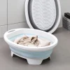 bassine pliable portable silicone plastique pliant ovale poignée rigide pieds antidérapants fond texturé planche lavage voyage camping vêtements délicats
