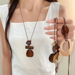 Colliers ovales avec pendentif en résine creuse pour femmes et filles, Vintage, longue corde, fleur hétérootypique, collier en bois, bijoux de fête rétro K1