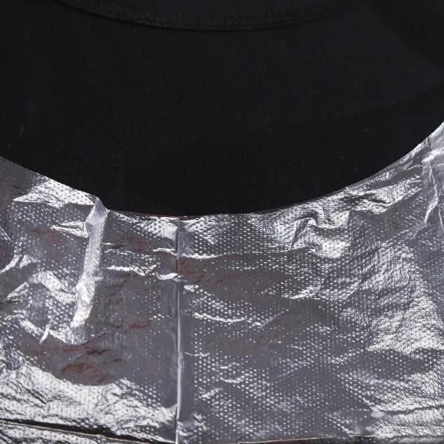 Tabliers jetables en plastique blanc – vue 6