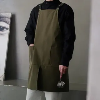 Tablier imperméable en polyester fendu sur le devant avec poches pour…