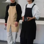 Tablier de serveur imperméable avec poches pour cuisine, restauration, café, fente avant, vêtements de travail Anti-salissure pour hommes et femmes pour Salon