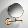 Miroir de salle de bain rond en or brossé – vue 1