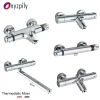 mitigeur thermostatique mural baignoire douche laiton chromé poli cylindrique double poignée cartouche céramique inverseur intégré bec orientable 40cm