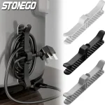 organisateur câbles mural adhésif sans perçage plastique ABS compact minimaliste antidérapant rainures maintien prises installation facile couleurs noir blanc gris