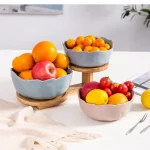 Assiette à fruits nordique ronde en céramique, bol Phnom Penh, salon moderne, bassin à deux couches, cadre en bois de bambou