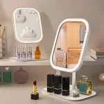 miroir maquillage pliant led table minimaliste rectangulaire coins arrondis cadre blanc éclairage tactile périphérique homogène socle plateau rangement inclinable verre