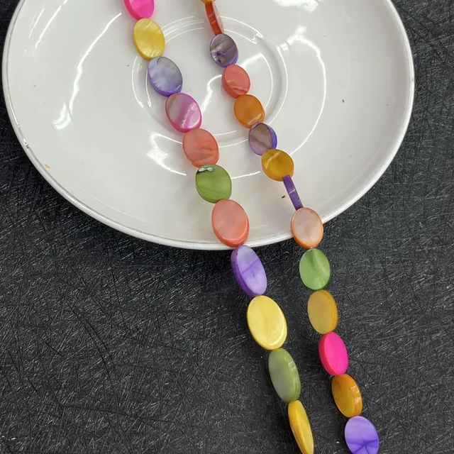 Perles de coquillage ovales 10x14mm