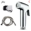 douchette bidet chromée pulvérisateur hygiénique buse perforée jet précis flexible spiralé inox tuyau ergonomique support mural