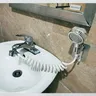 Connecteur de robinet d'eau bidirectionnel pour toilettes – vue 1