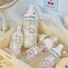 Bouteille distributrice de voyage avec autocollant mignon – vue 1