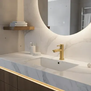 Robinet de salle de bains en or brossé